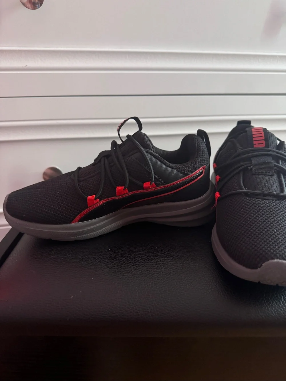 Puma Kids Black Sneakers with Red Accents